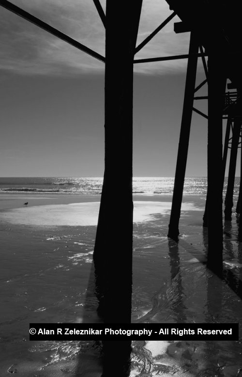 Pier support and wet sand B&W