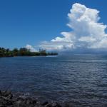 Clouds towering over Tahiti from Moorea